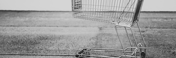 a shopping cart in a parking lot
