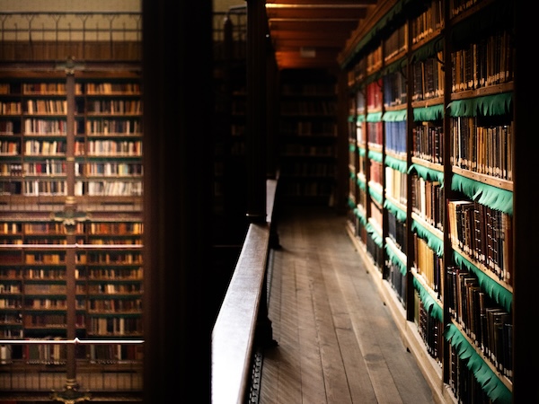 an aisle of a large library